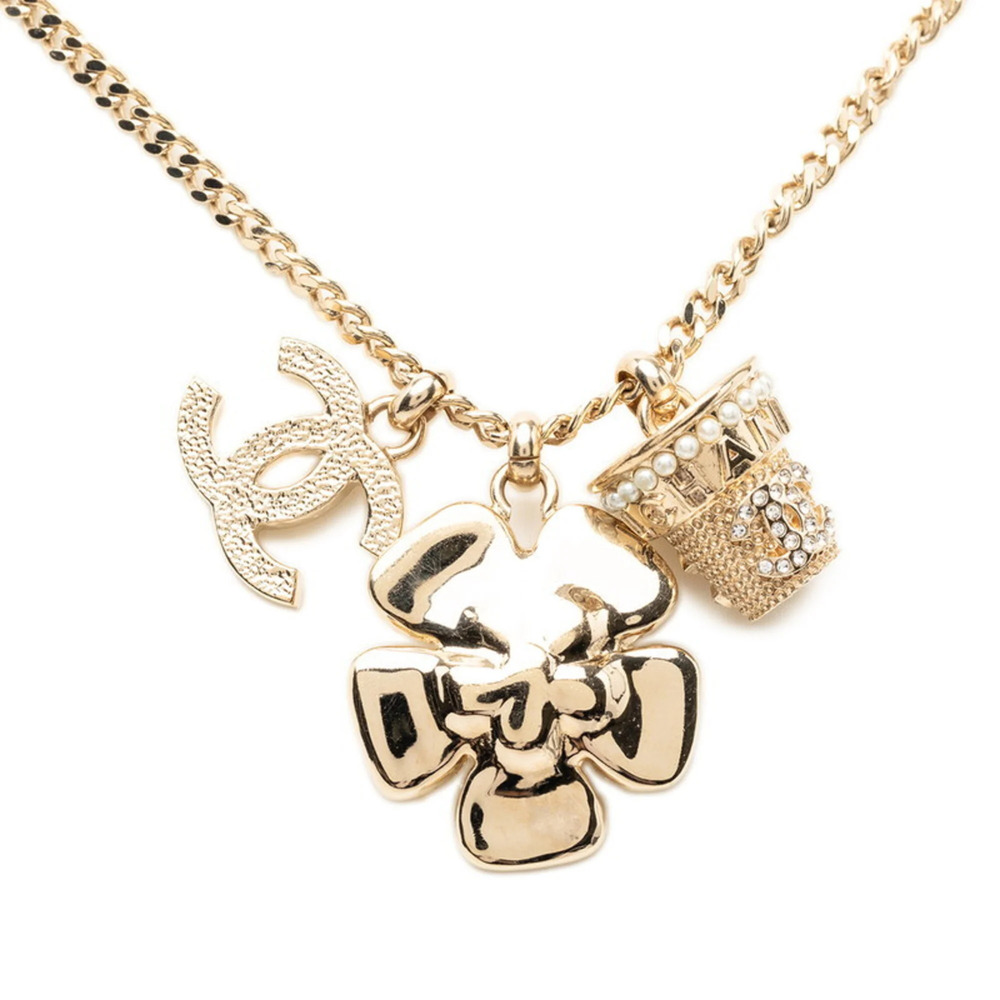 CHANEL Gold Pearl Logo Necklace - Picture 2 of 5